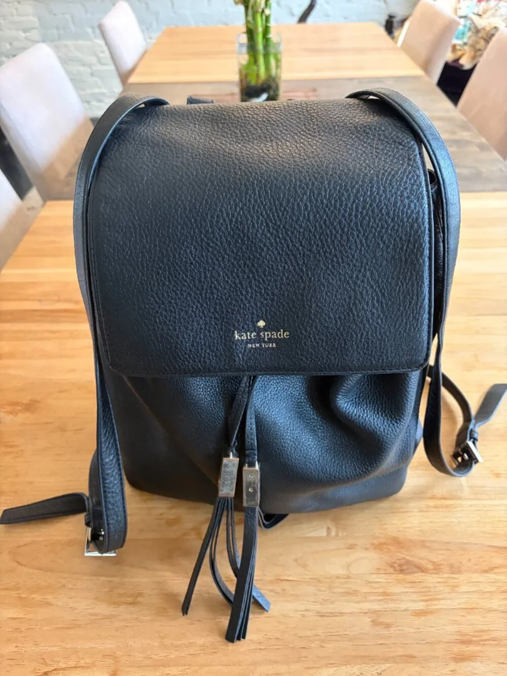 Kate Spade Pebbled Leather Backpack with tassles